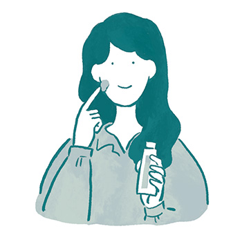 外用薬(ぬりぐすり)を塗布する女性