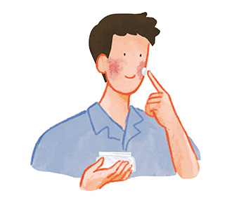 保湿剤を塗る男性