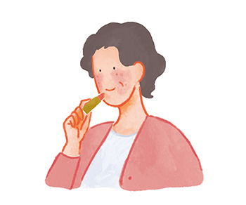 メイクをする女性