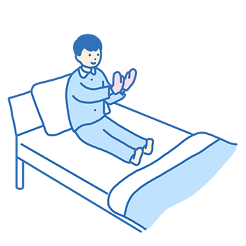 かきむしり防止手袋 をつける男性