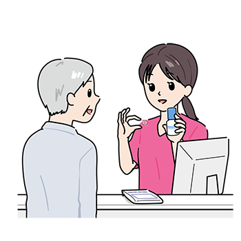 ローション薬の説明をする薬剤師(女性)