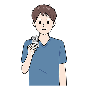 錠剤を持つ薬剤師 (男性)