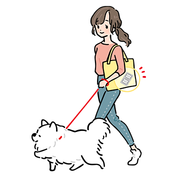 犬とお散歩をする女性