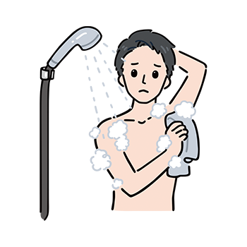シャワーをあびる男性